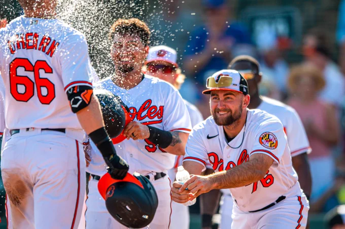 Cowser splashing water in O’Hearn’s face