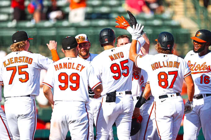 From left to right: Kjerstad, Handley, Cowser, Mayo, Holliday, and Cordero celebrating