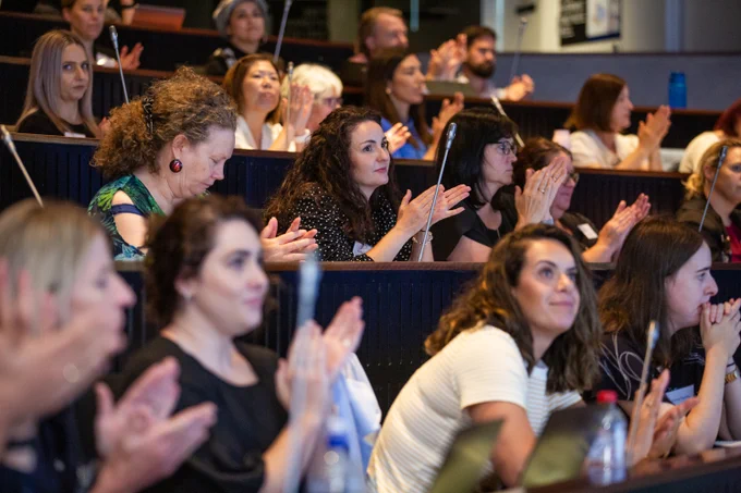 Numeracy Leader Summit attendees seated in the Academy's theatre at the North Melbourne site