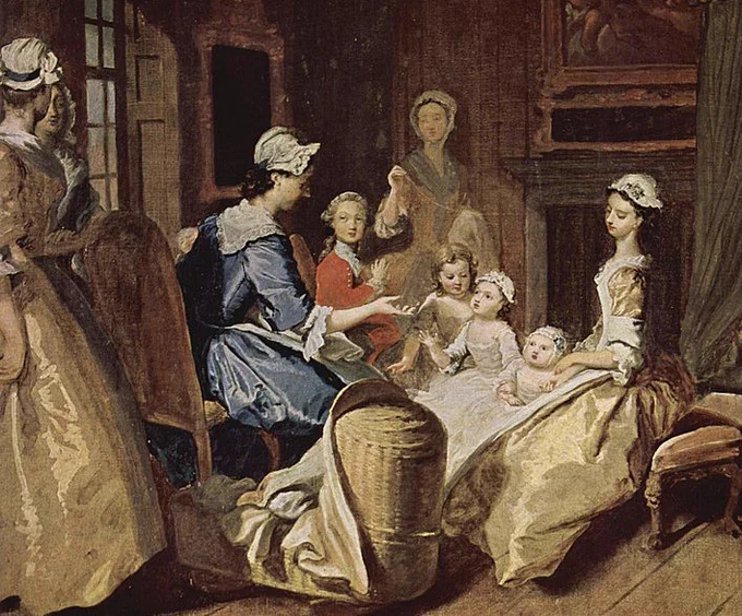 Eighteenth-century painting of a family scene with many women and children. The women wear lovely gowns and bonnets. A bassinet stands in the foreground. The woman in the blue fown in the center of the image gestures toward the youngest children.