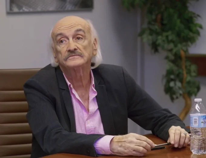 Ruben Rabasa in the Focus Group sketch from I Think You Should Leave, giving a knowing look.