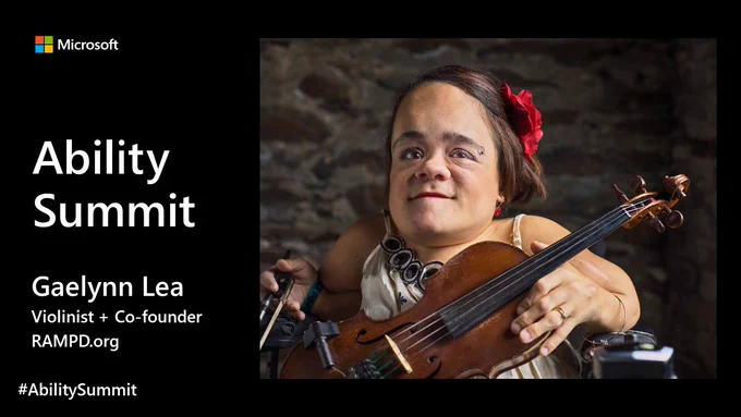 Black background with Microsoft logo in the top left corner with copy overlay; Ability Summit, Gaelynn Lea, Violinist   Co-founder https://msft.it/60145SL34. Image on the right of a woman with brown hair and a flower in her hair, she is holding a violin, in a wheelchair, her name is Gaelynn Lea.