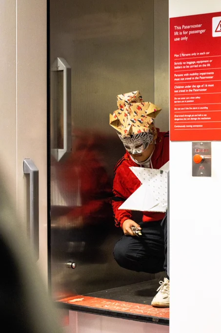 Musician in the paternoster