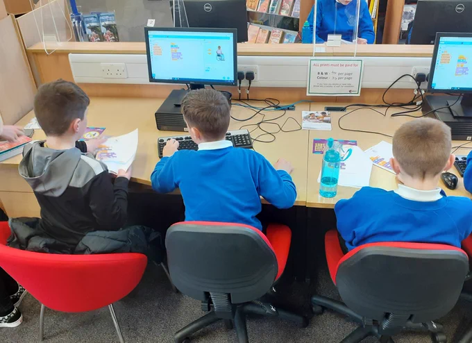 Children coding at the library 