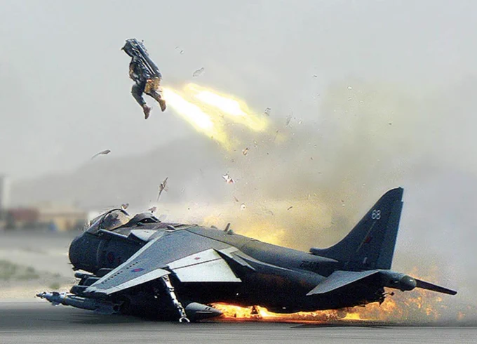 Pilot ejects from a burning Harrier on the runway 