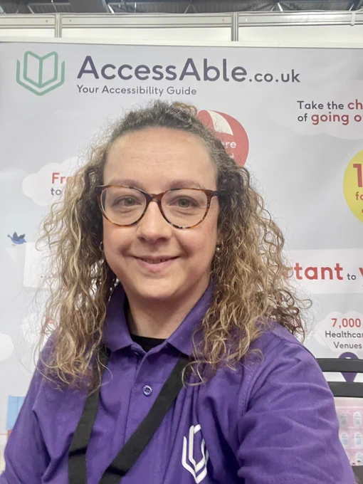 Selfie of Carrie-Ann on an exhibition stand