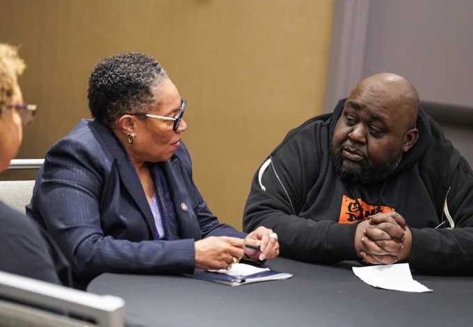 Secretary Fudge participating in a conversation with tenant leaders.