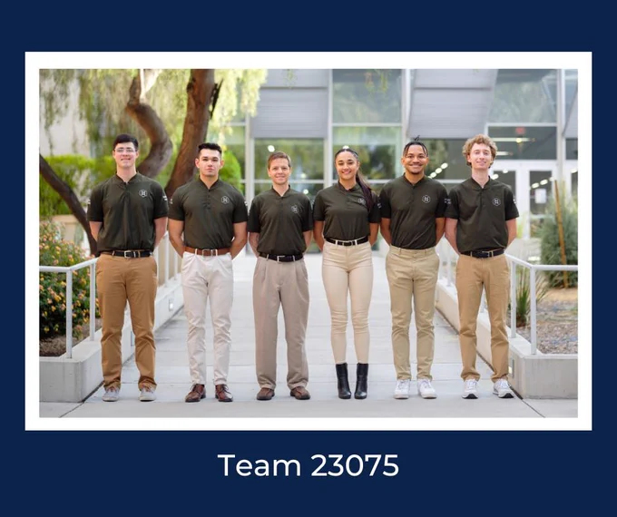 A group of five males and one female. They are standing in a line, outdoors, hands behind their backs and smiling. They are all wearing matching olive green polo shirts and tan or white pants. 