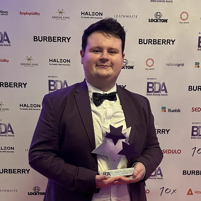 Me holding the award for Diversity in Technology