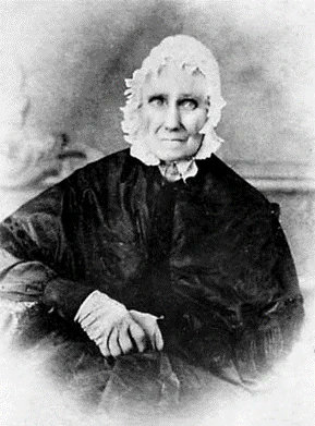 Photograph of an elderly Sarah Bush Lincoln wearing a dark dress, light bonnet, and light gloves.