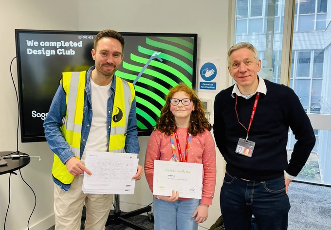 New design club member celebrating completing her mobile app design.