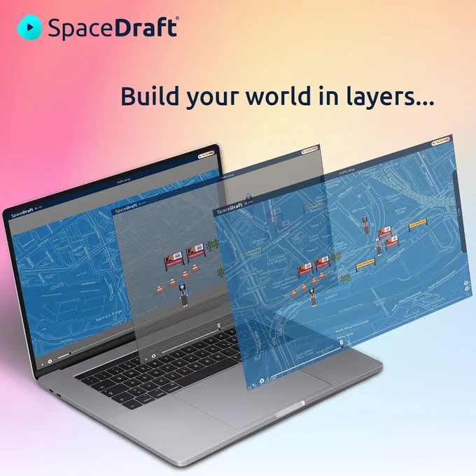 A laptop displaying the background and pin layers in a SpaceDraft used to show a procedure for setting up road works. 