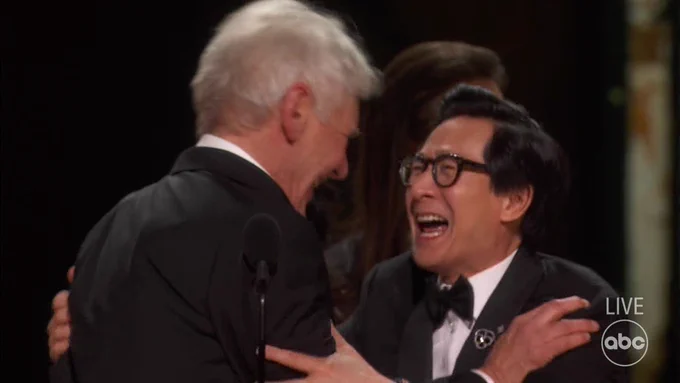 Ke Huy Quan hugging Harrison Ford.
