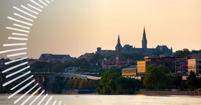 Sunset behind Healy Hall with the Potomac River and translucent rays overlaid on the image