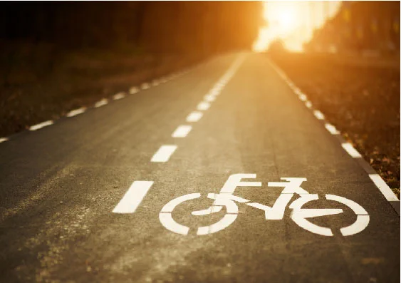 A bicycle path at sunrise.