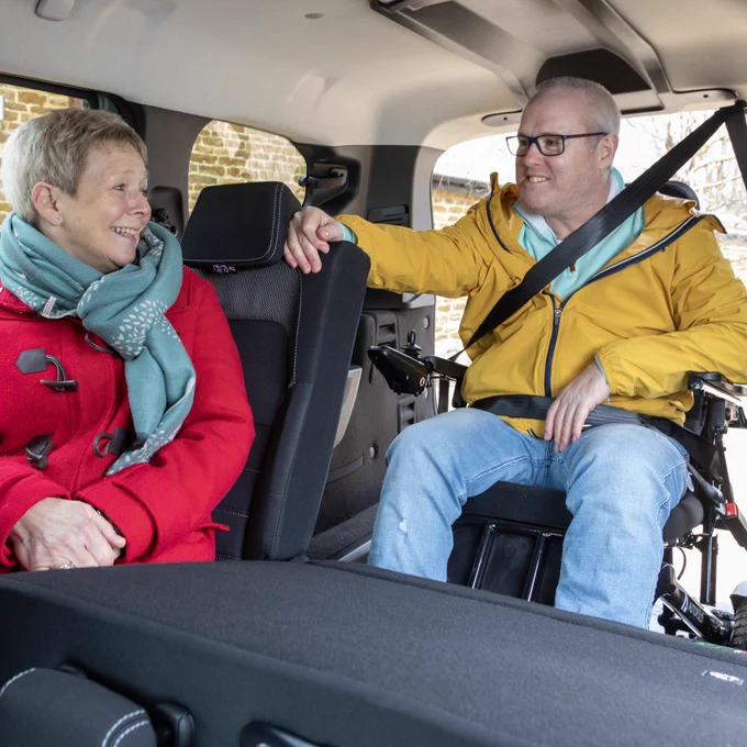 Inside the rear of the Dacia Jogger Wheelchair Accessible Car. Andrew Russell, one of the first customers said: “I had been using accessible taxis and with some of them you just felt like a piece of luggage travelling in the boot! I don't feel like that in the Dacia Jogger as I am sat further forwards, so I can sit with my grandchildren and just feel like part of the family.”