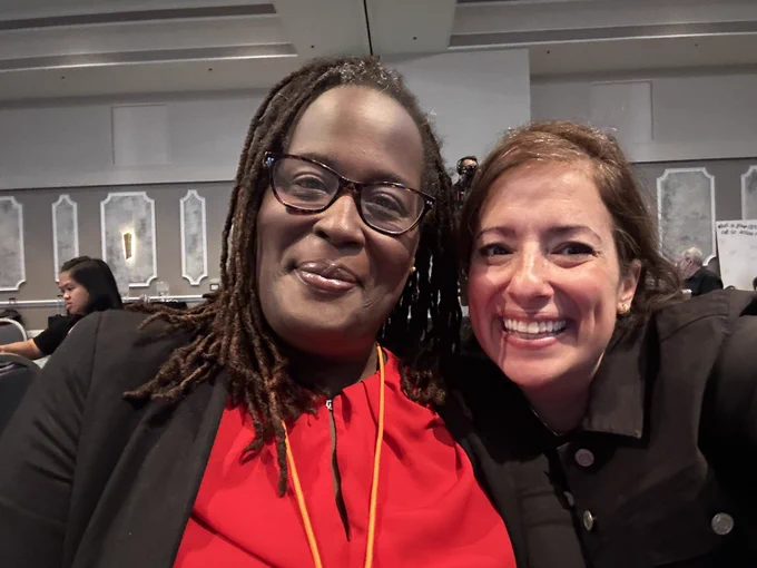 Robin Williams- a brilliant black woman smiling with Mia Laudato smiling - two happy friends!