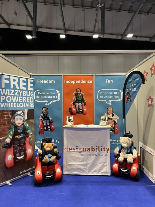 Designability’s promotional stand setup with Wizzybugs at Kidz to Adultz Middle