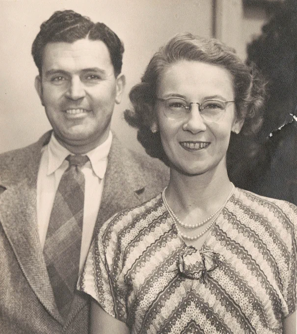 George and Margaret Hammer smiling, wearing smart formal clothes.