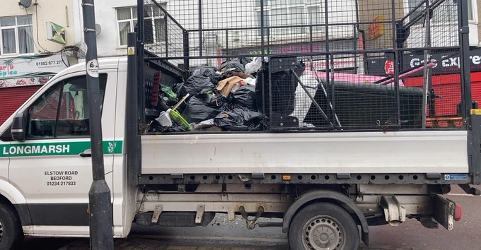 Photo of van with waste removed from the street containing large amounts of waste 