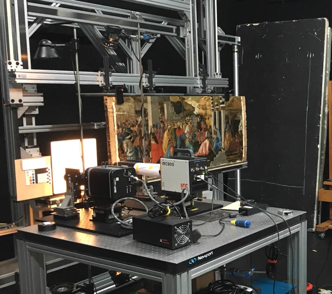 Sandro Botticelli and Filippino Lippi's, 'Adoration of the Kings', about 1470 is scanned by a piece of equipment. 
