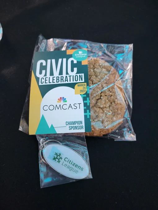 Branded event swag and wrapped cookie