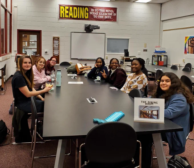 Students enjoying snacks before the Murder Mystery game began