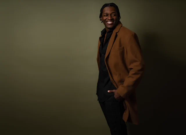 Michael Solomon wearing a suit and tie.
