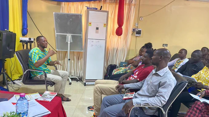 Sign language interpreter translating for deaf participants
