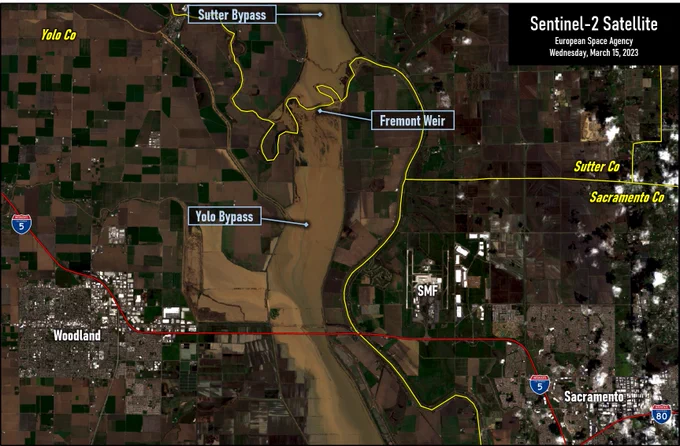 Satellite image of flooding along the Lower Sacramento River from Wednesday, March 15, 2023, zoomed in at Sutter Bypass and Yolo Bypass filled with water as a flood control measure.