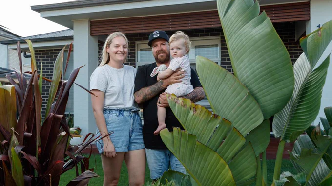 Nicola and Justin Holl and their daughter Remy. The couple searched across the Hunter for an affordable first home before eventually settling in Cliftleigh. Photo by Max Mason Hubers.