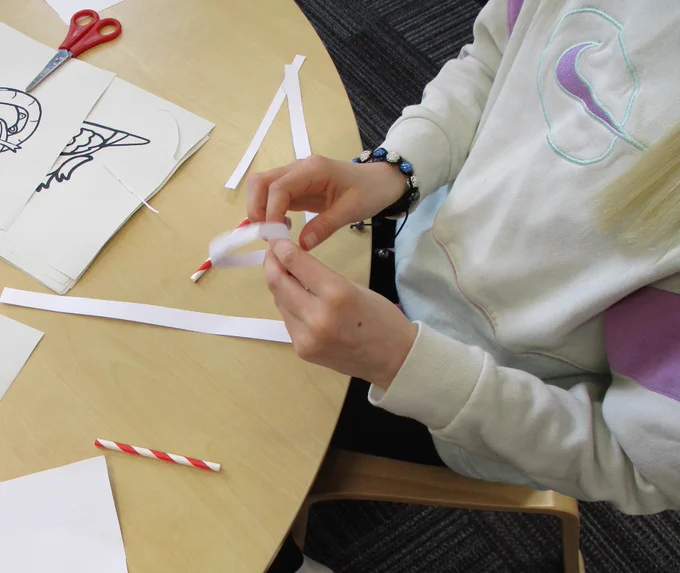 making a glider with paper and straws