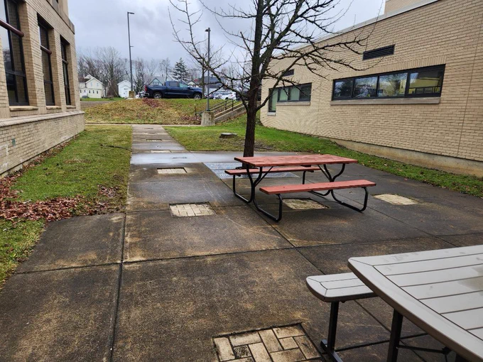 Courtyard featuring a picnic table
