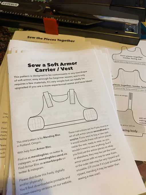 Zine Sew a Soft Armor Carrier / Vest, text: This pattern is designed to be customizable to any size/shape of soft armor, easy enough for beginner sewers, and it only requires a few materials. It's very simple but can totally be upgraded if you are a more experienced sewist and have ideas! 
This zine/pattern is by Mending Bloc in Portland, Oregon.With help from Armor Bloc.Find us as mendingbloc on twitter & instagram, or at mendingbloc.carrd.co. Find Armor Bloc as armorblocpdx on twitter & instagram.Please distribute this freely, digitally and/or physically!
These instructions are for if you source a set of soft armor pieces secondhand or surplus. If you were to buy a new vest, it would include these soft armor pieces inside the vest, ready to wear, so you wouldn't need to sew anything; but if you find just the armor pieces on ebay or elsewhere, they may be just the inner armor pieces with no way to wear them, or the outer vest may be very ripped.(if it's ripped, mending may be easier!)