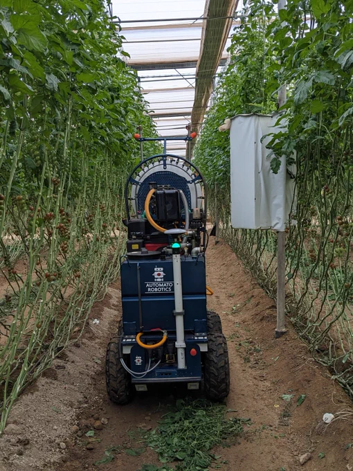 AutoSprayer robot avoiding a beehive housing inside a greenhouse in Spain