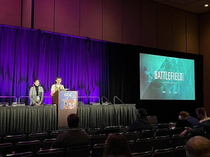 Photo of the speakers on stage at GDC