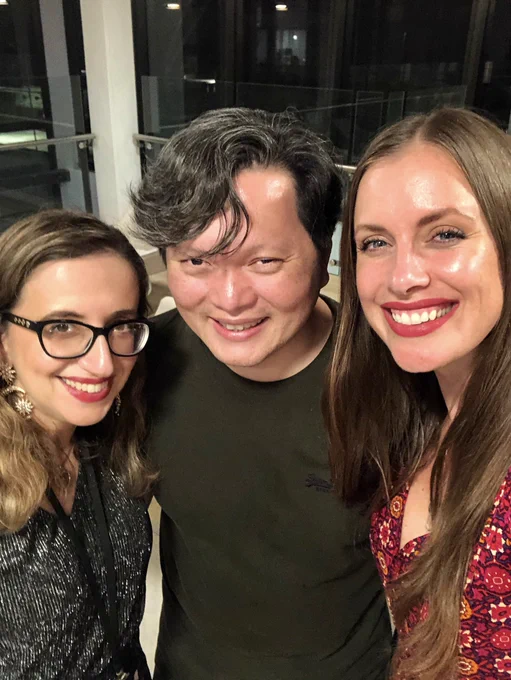 Stephanie, Jimmy Van and Kirstin smile at the camera.