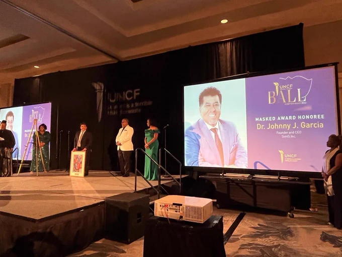 Johnny Garcia honoree on stage