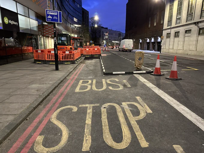 Floating bus stop. Bus lane taken away to provide for cyclists.