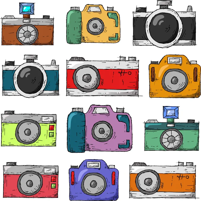 12 cameras all lined up facing forwards. Three along and four down format. All are different sizes, designs, colours with a variety of lens and clicker formats