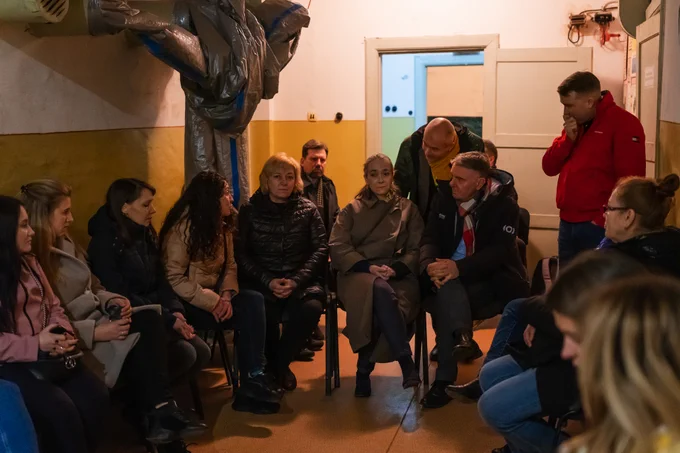 Noel Curran and Delphine Ernotte Cunci meet UA:PBC staff in a bomb shelter. Photo: Mykola Ivanchyk