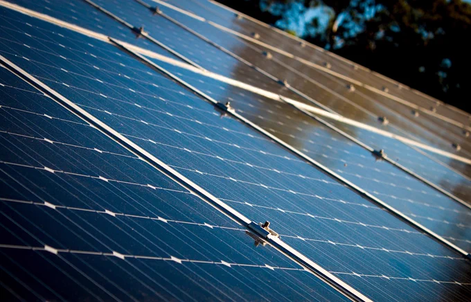 Stock image of a solar PV array by StockSnap from Pixabay