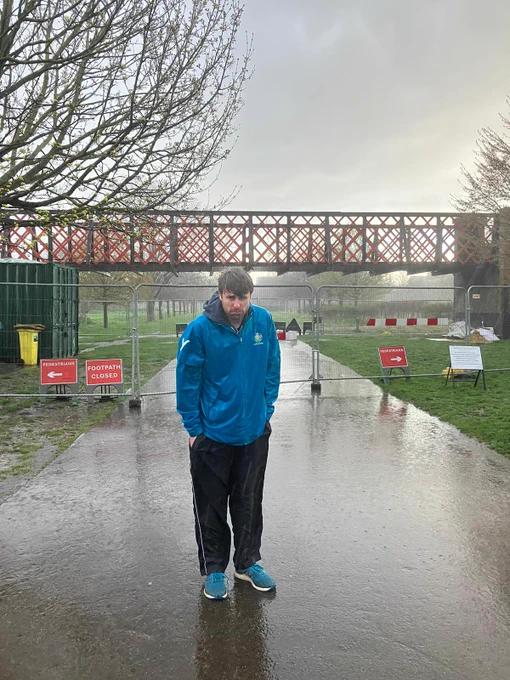Our event director being seriously rained on when trying in vain to find a safe diversion for our parkrunners