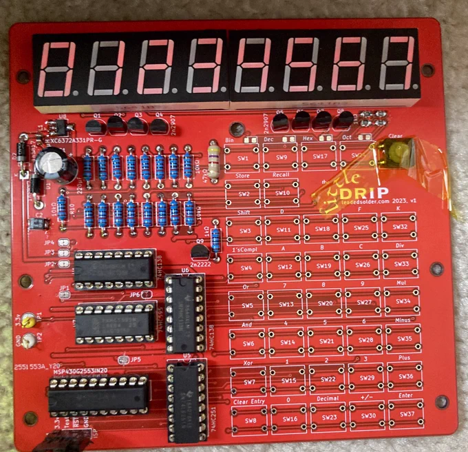 My calculator PCB, showing 01234567 on its eight digit, seven segment display.