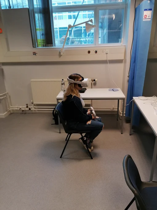 An open day visitor trying out a Virtual Reality simulation