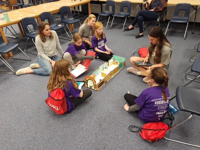 Rebecca Reynolds judging students as they tell their Sphero Hero story! 