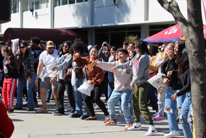 Students dancing and cheering