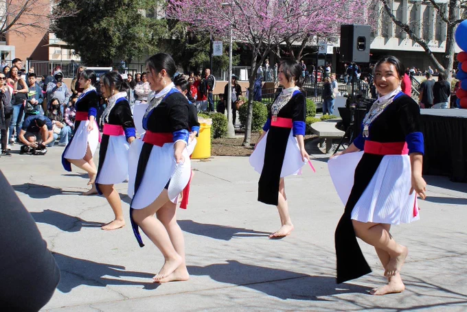 Students dancing in cultural outfits