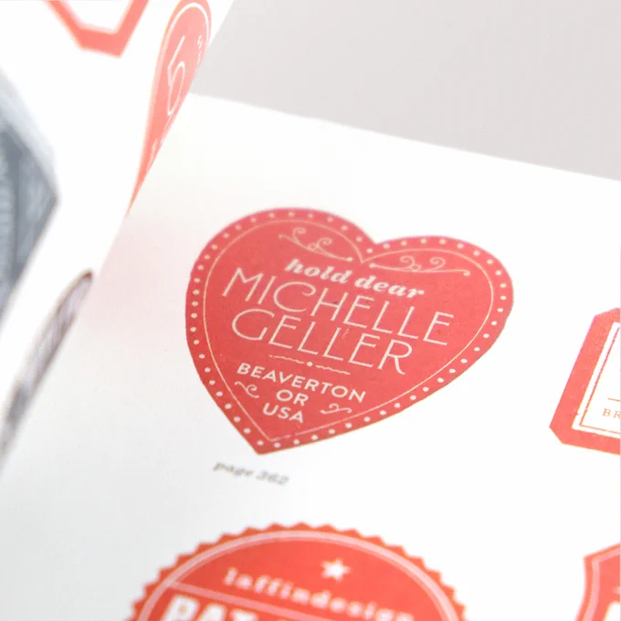 A detail shot of the book featuring a red heart with “Michelle Geller” written inside of it.