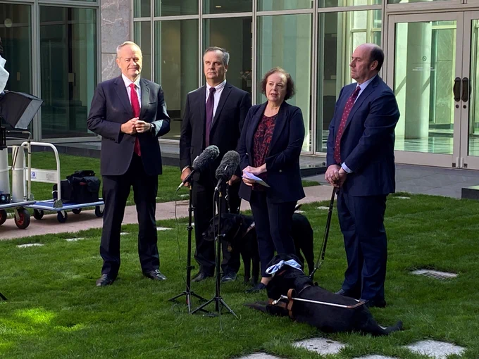 Ministers Bill Shorten, Carol Brown, John Barlow, and Vision Australia's Chris Edwards